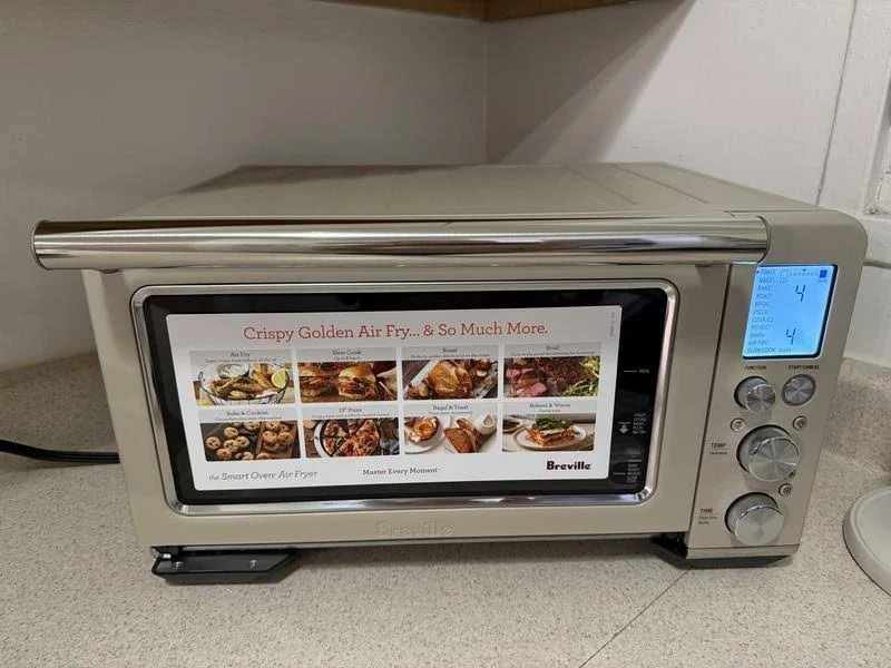 view of our own purchase testing breville the smart oven air fryer (bov860bss) unboxing package arrival several weeks to months